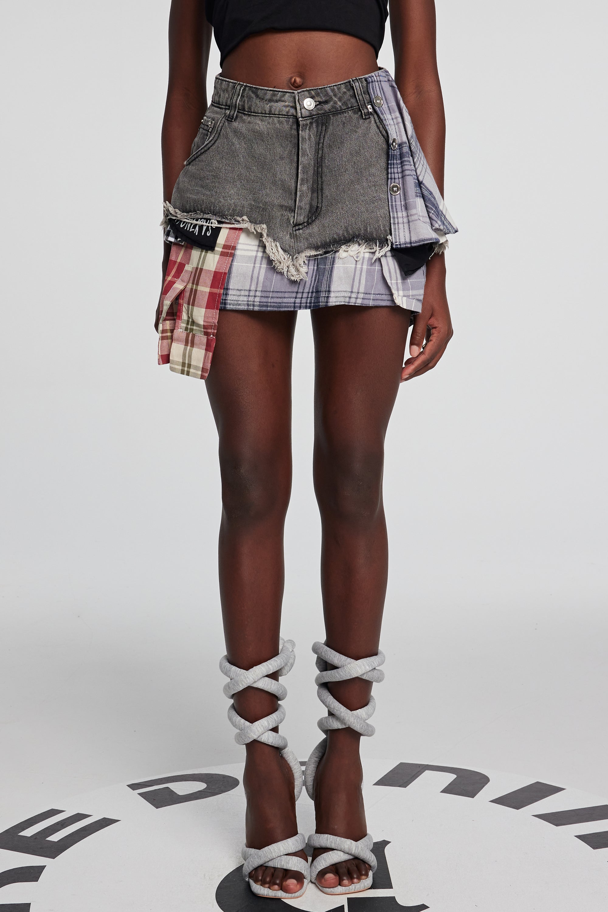 Kenna Grid Deconstruct Patchwork Mini Skirt In Black – Innovare Denim