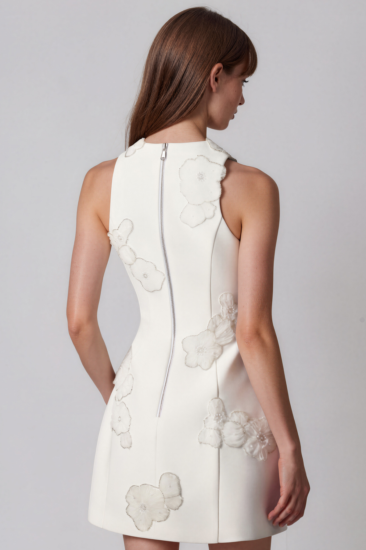 Kimeya Sleeveless Pearl Floral Mini Dress