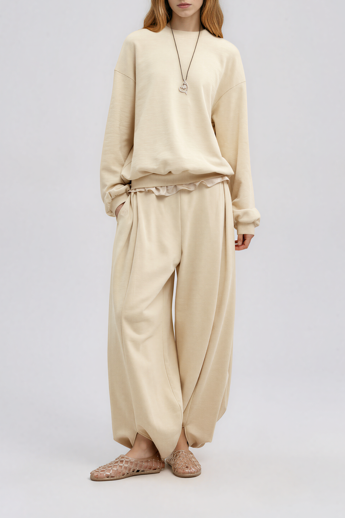 Kwadwo Backless Lace Pants In Apricot