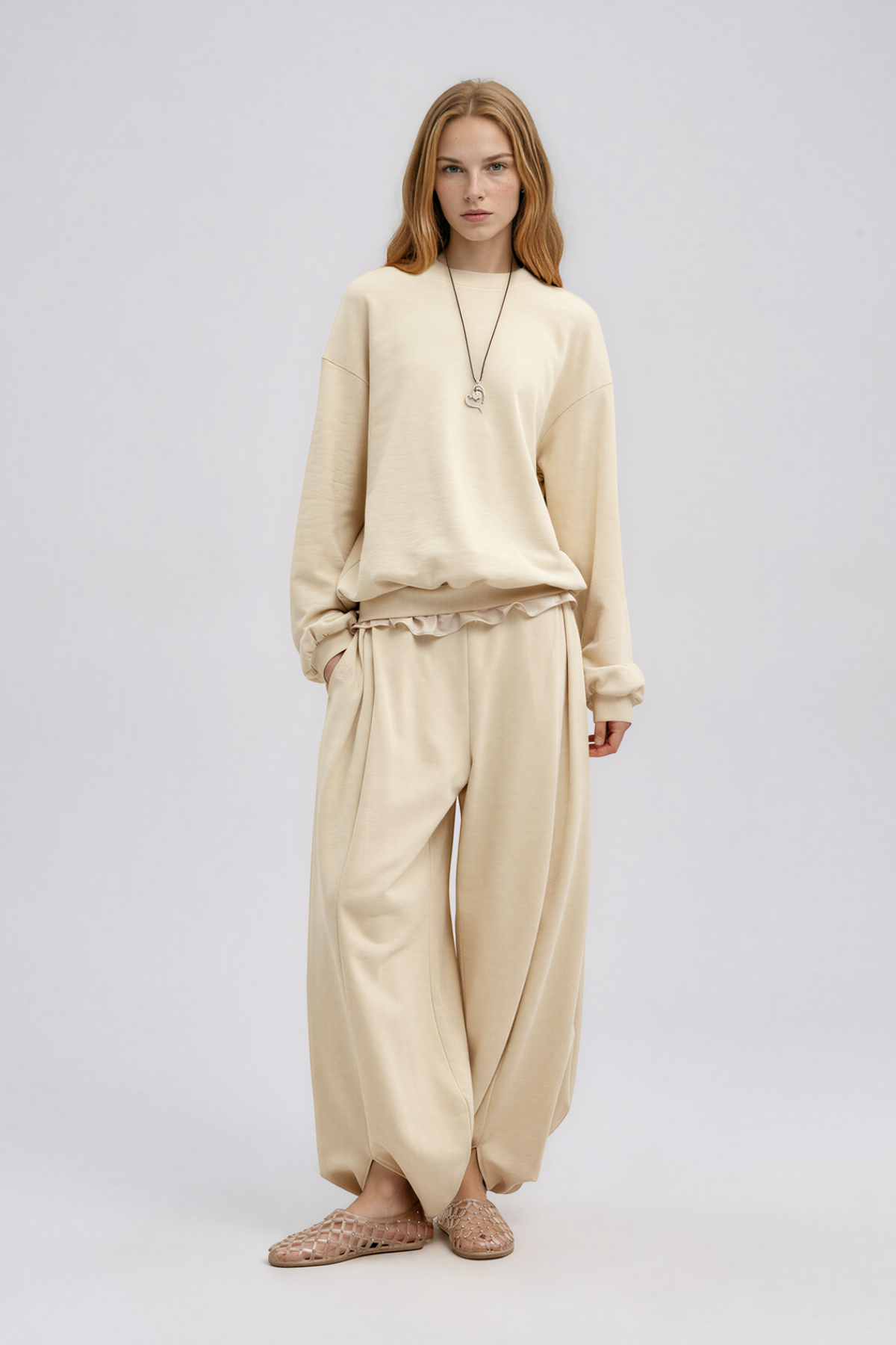 Kwadwo Backless Lace Pants In Apricot