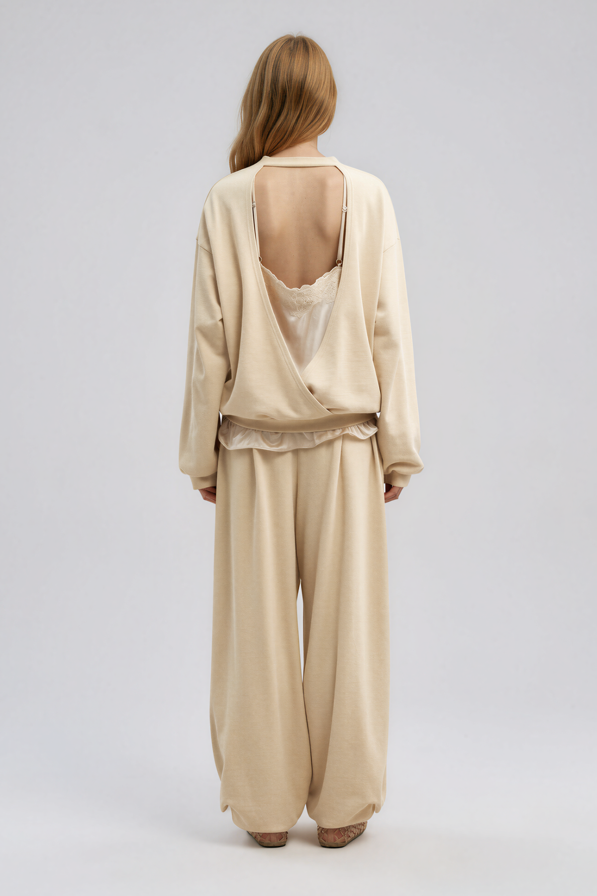 Kwadwo Backless Lace Pants In Apricot
