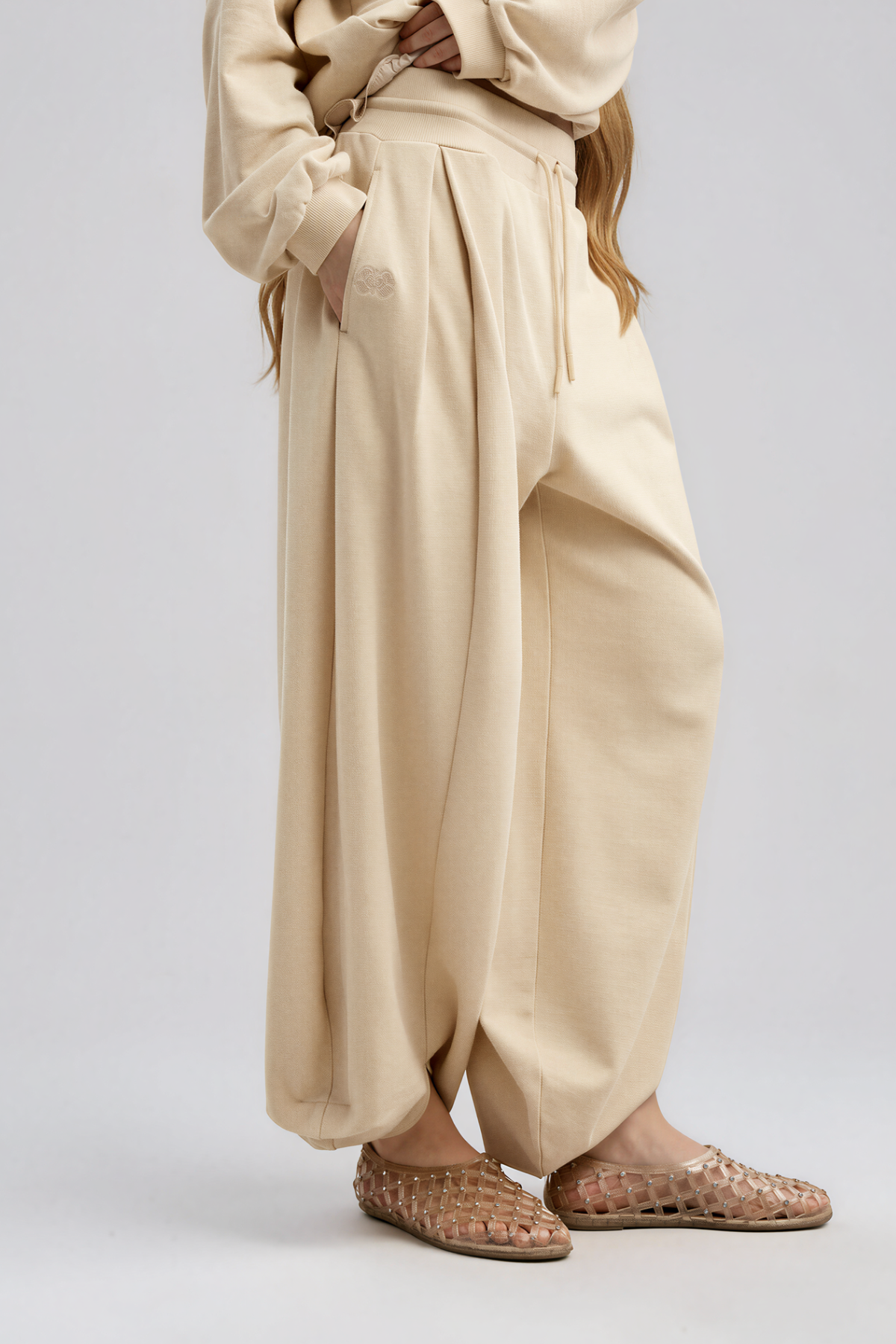 Kwadwo Backless Lace Pants In Apricot