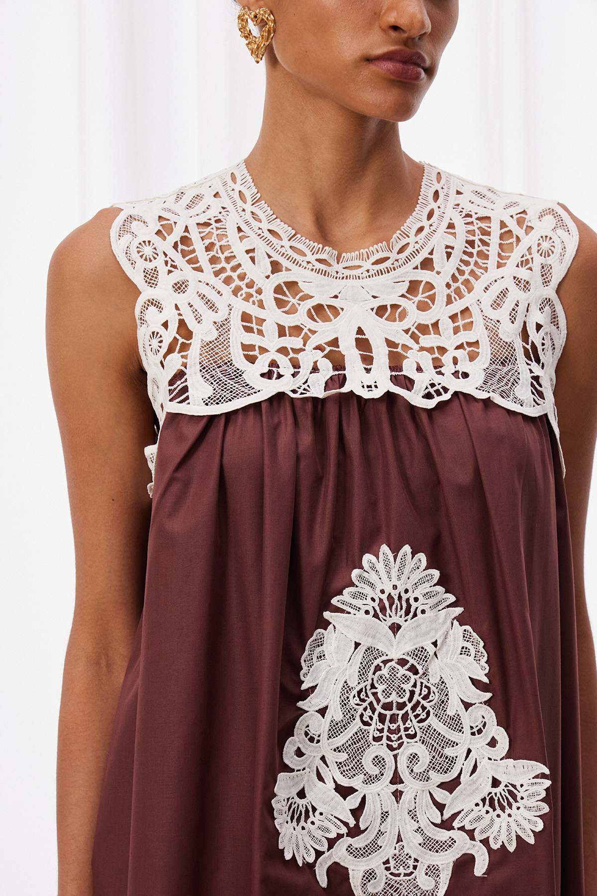 Maachah Sleeveless Lace Mini Dress