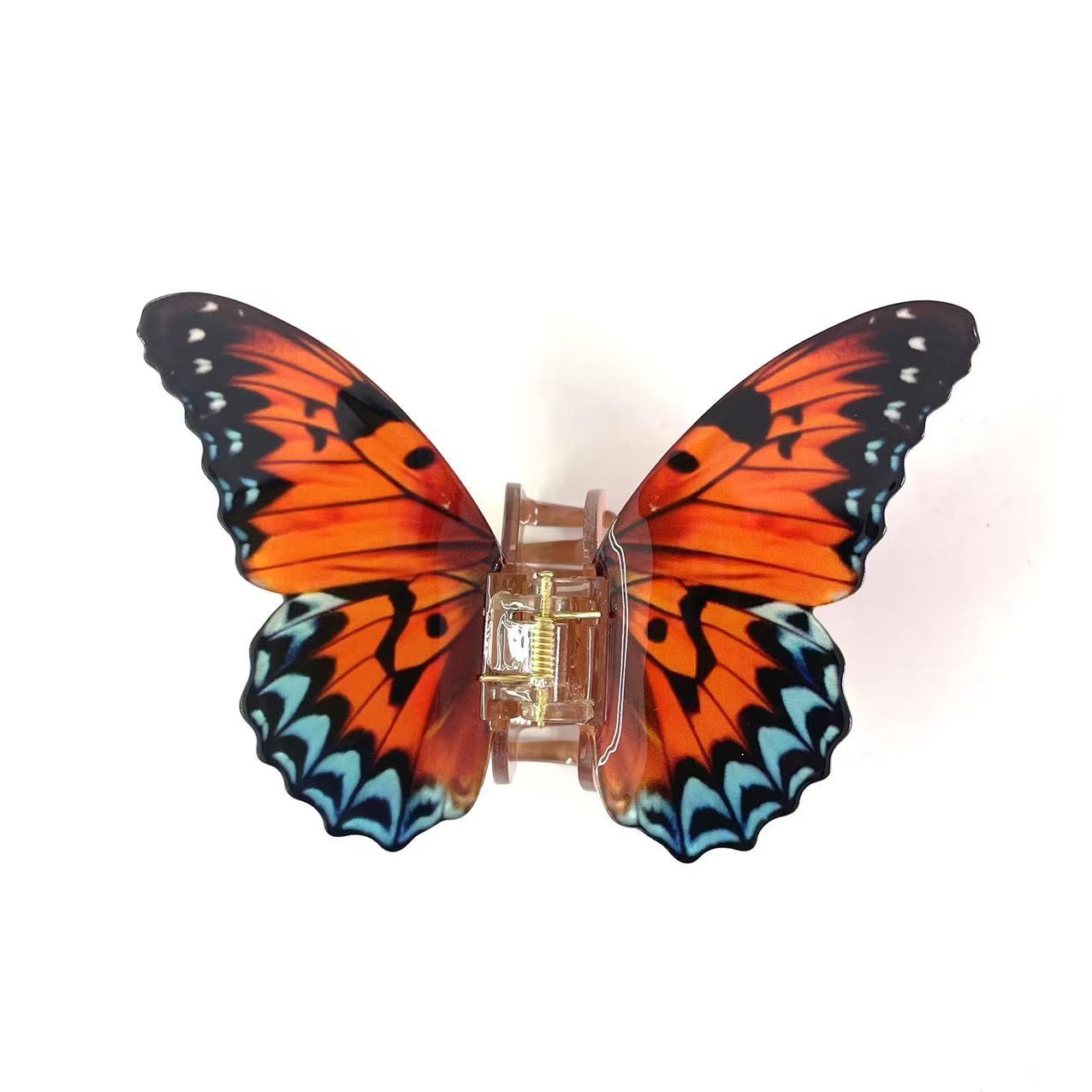 Vanessa butterfly hair claw in Orange