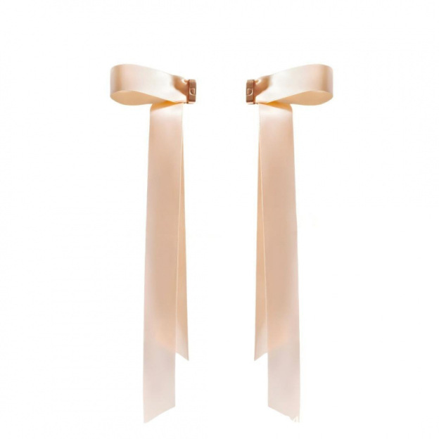 Bow-shaped magnetic hair clip