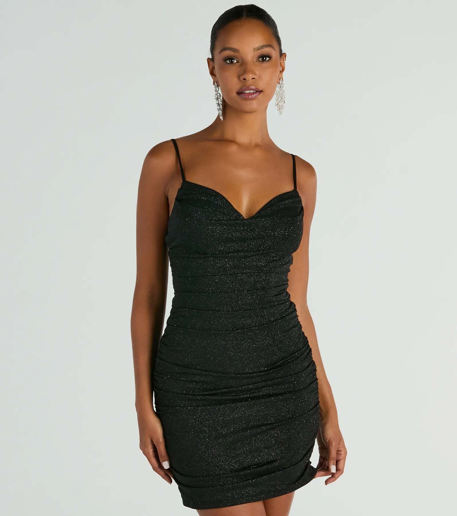 Keep it classic with the Elsa Glitter V-Neck Party Dress, a feed-worthy pick from Windsor's black homecoming dress collection made to stop their scroll from pictures to the dance floor.