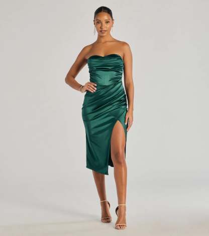 The Kaleen Sleeveless Satin Wrap Midi Dress is a hunter green midi dress, featuring an elevated midi-length silhouette perfect for wedding guest attire, romantic date nights, or effortless everyday styling.