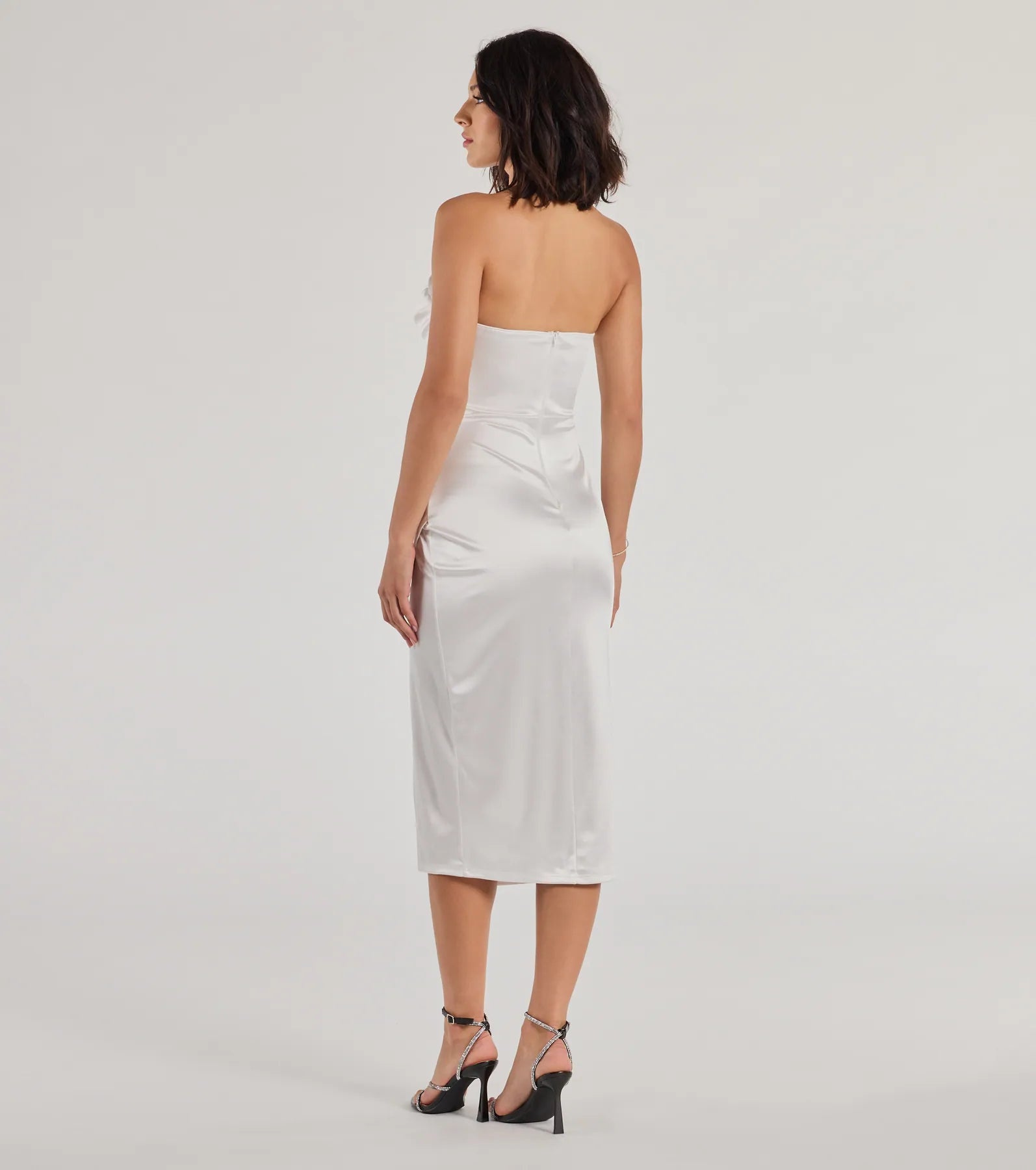 Own the spotlight in the Kaleen Sleeveless Satin Wrap Midi Dress, a white formal dress crafted to deliver luxe style for winter weddings, Military Balls, or any special event.