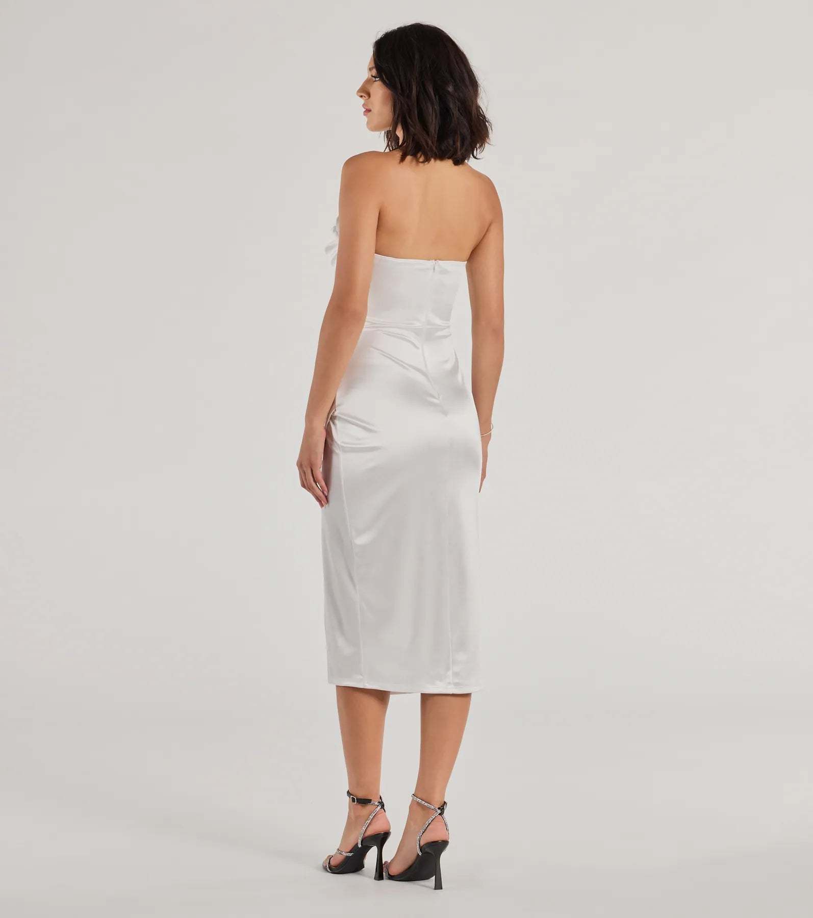 Own the spotlight in the Kaleen Sleeveless Satin Wrap Midi Dress, a white formal dress crafted to deliver luxe style for winter weddings, Military Balls, or any special event.