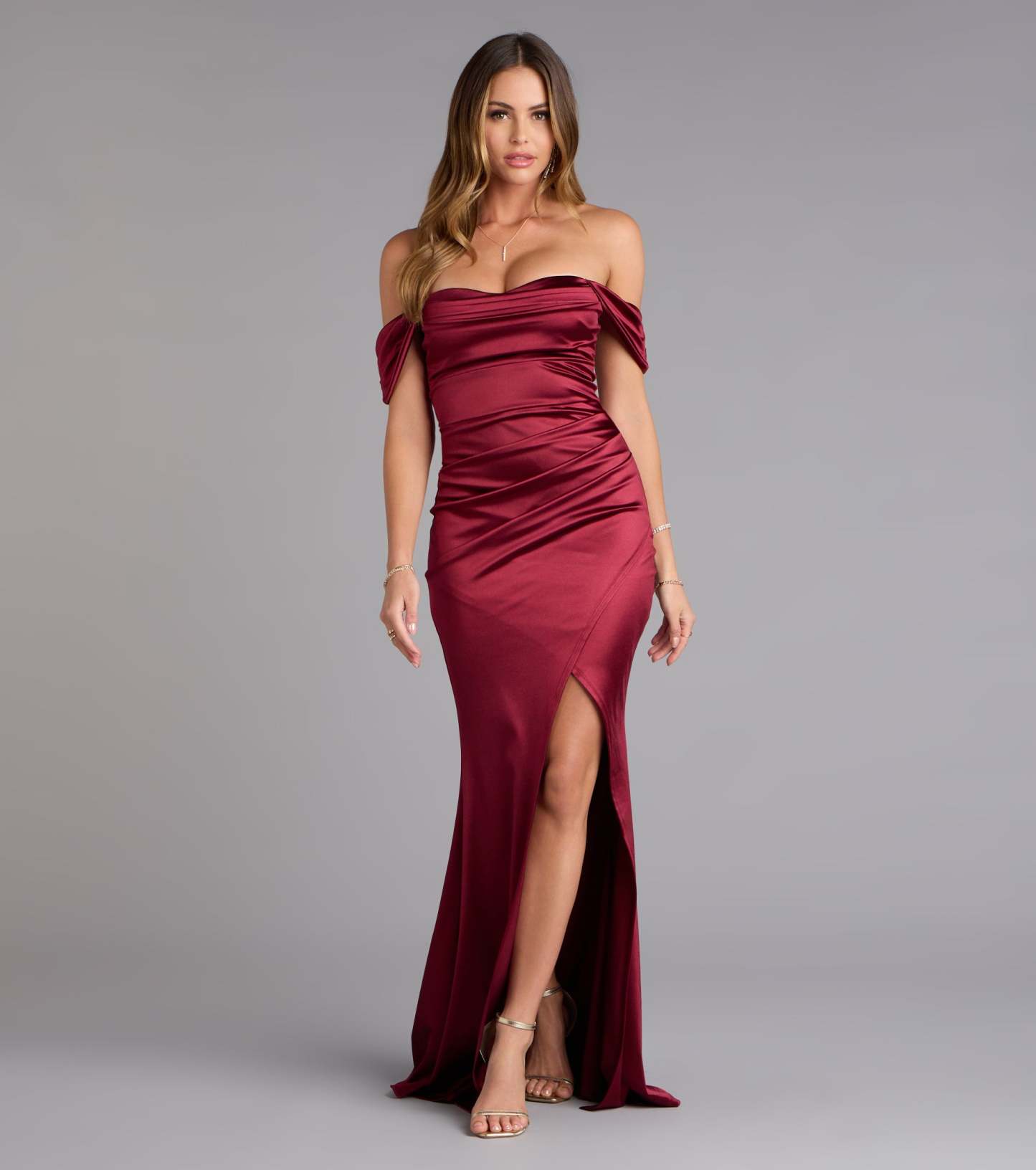Feel polished and confident in the Belinda Off-The-Shoulder Slit Satin Formal Dress, a prom dress designed with luxe fabric and modern detail that shows off your vibe.