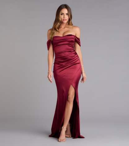 Feel polished and confident in the Belinda Off-The-Shoulder Slit Satin Formal Dress, a prom dress designed with luxe fabric and modern detail that shows off your vibe.