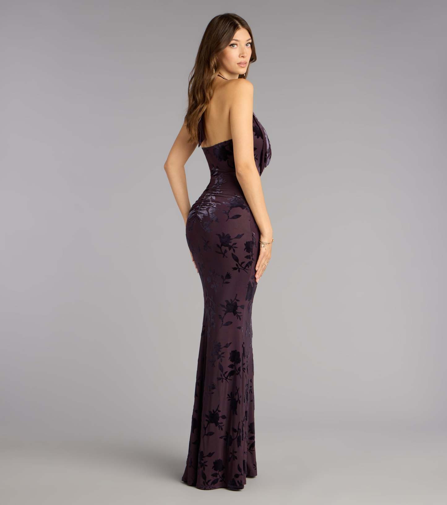 The Morgan Plunge Cowl Neck Mermaid Formal Dress is a prom dress that blends trend-forward design with a flattering fit, perfect for celebrating your night with confidence.