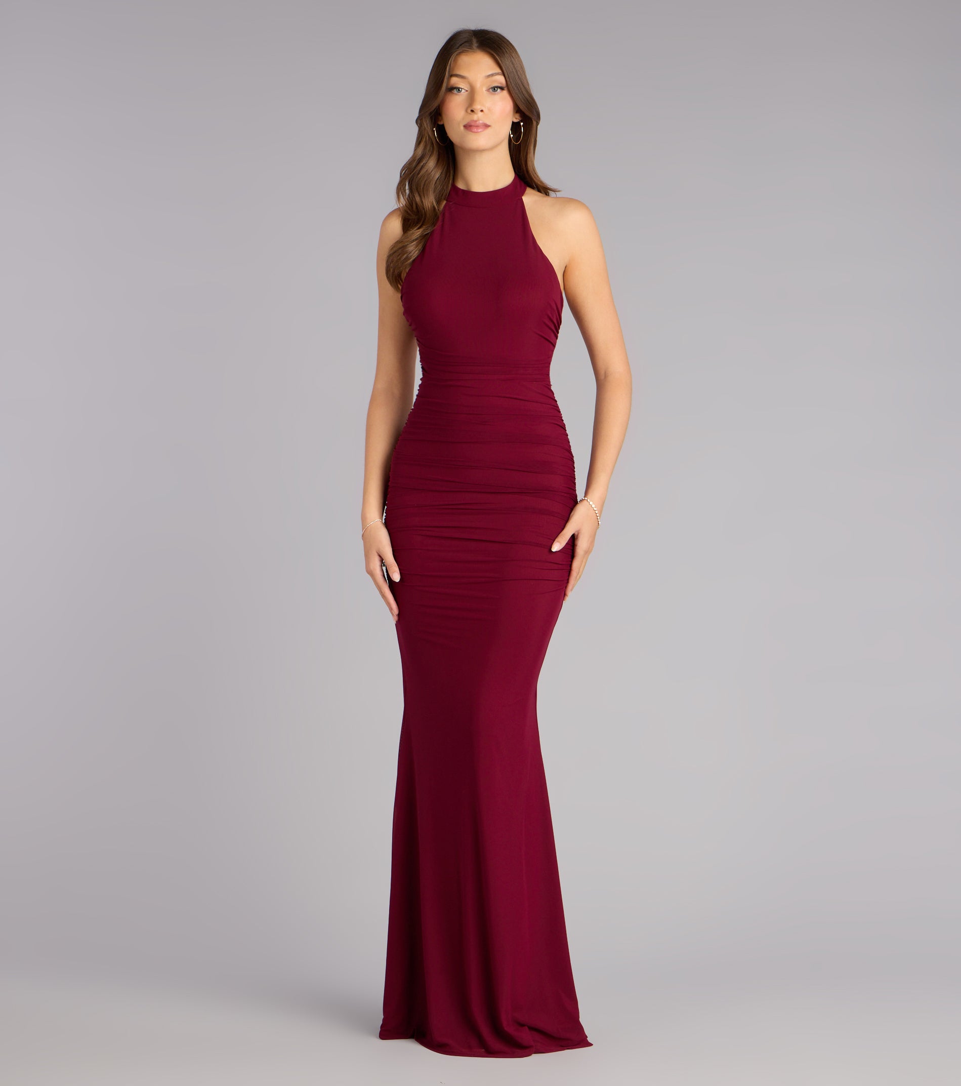 The Stefania Lace Open Back Mermaid Formal Dress is a wine prom dress that blends trend-forward design with a flattering fit, perfect for celebrating your night with confidence.