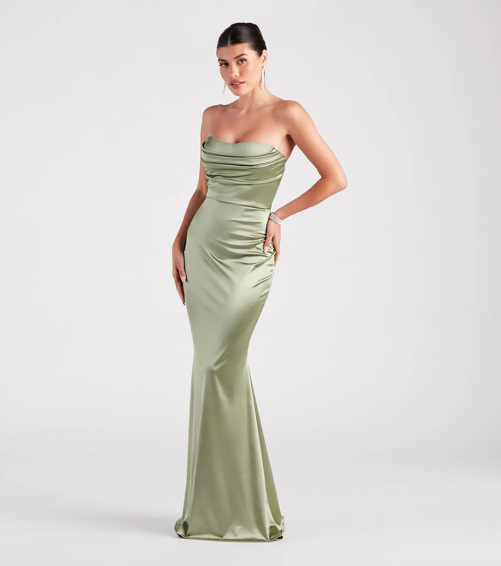 Make a bold statement in the Priscilla Formal Satin Strapless Mermaid Dress in sage green, the perfect green dress for weddings, cocktail hours, nights out, and/or seasonal celebrations.