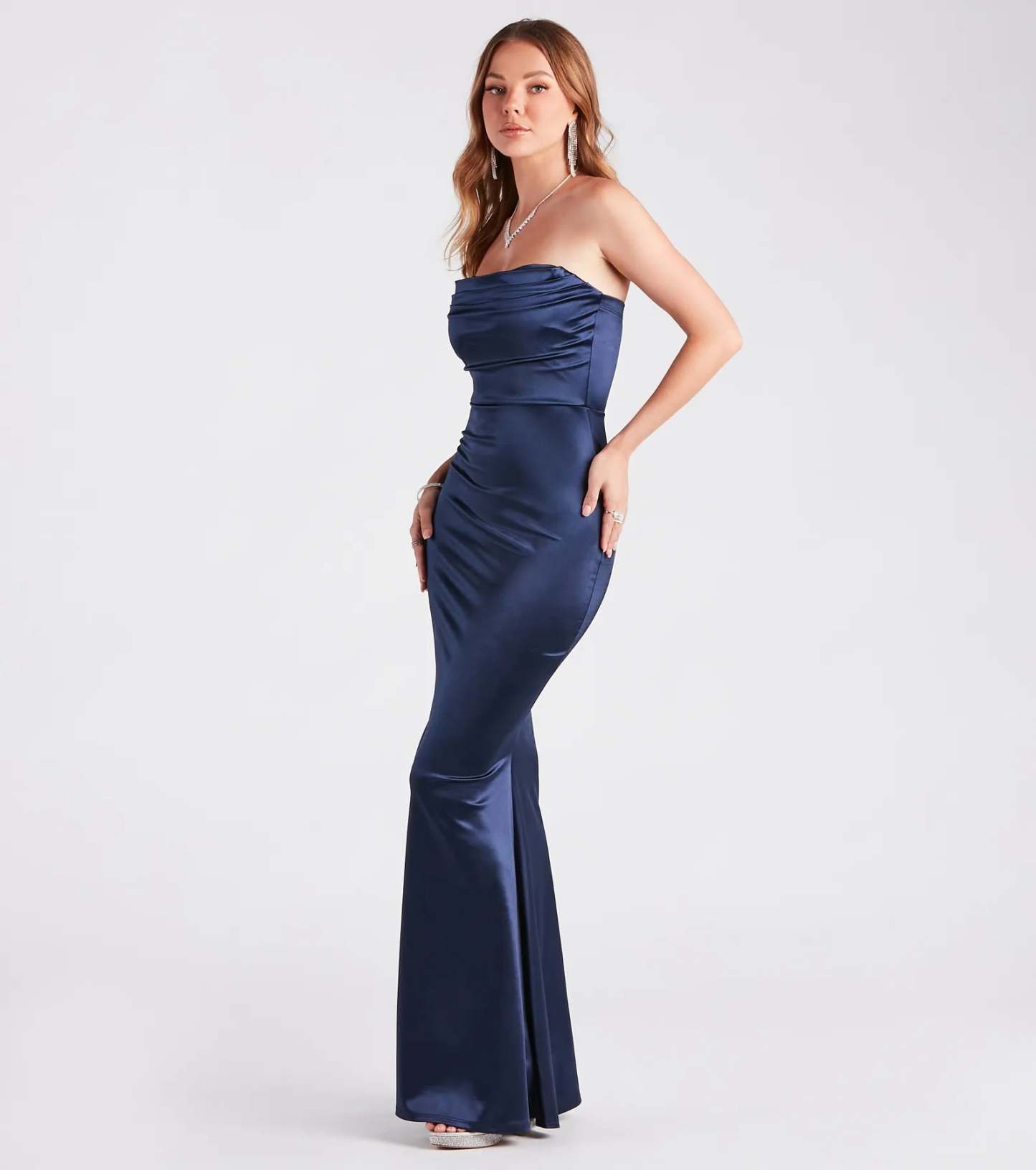 Make a bold statement in the Priscilla Formal Satin Strapless Mermaid Dress in navy blue, the perfect dress for Prom 2026, formal wedding guest attire, or military ball.