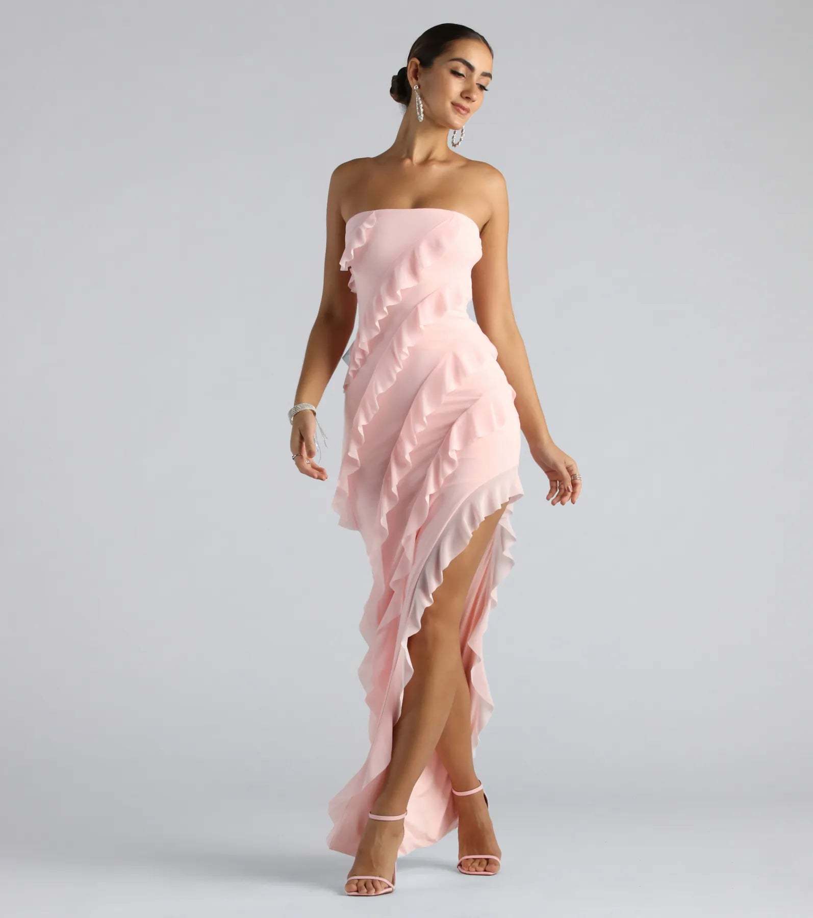 Style your Prom 2026 with the Gabby Formal Mesh Strapless Ruffle Long Dress, a trendy pink formal dress designed with new and unqiue details for your milestone moment.