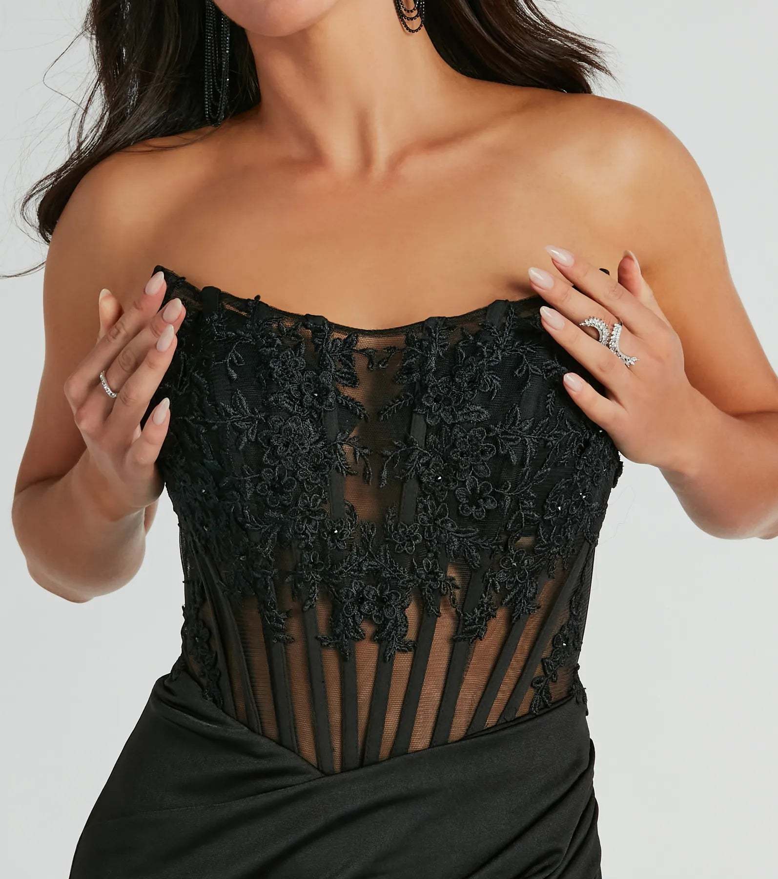 Make a bold statement in the Shayla Strapless Corset Lace Formal Dress in black, the perfect dress for Prom 2026, formal wedding guest attire, or military ball.