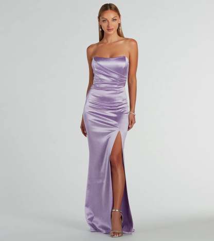 Add royal flair with the Aliyah Strapless Mermaid Satin Glitter Dress in lavender, a viral-worthy pick from the purple homecoming dress collection made to light up your HOCO feed.
