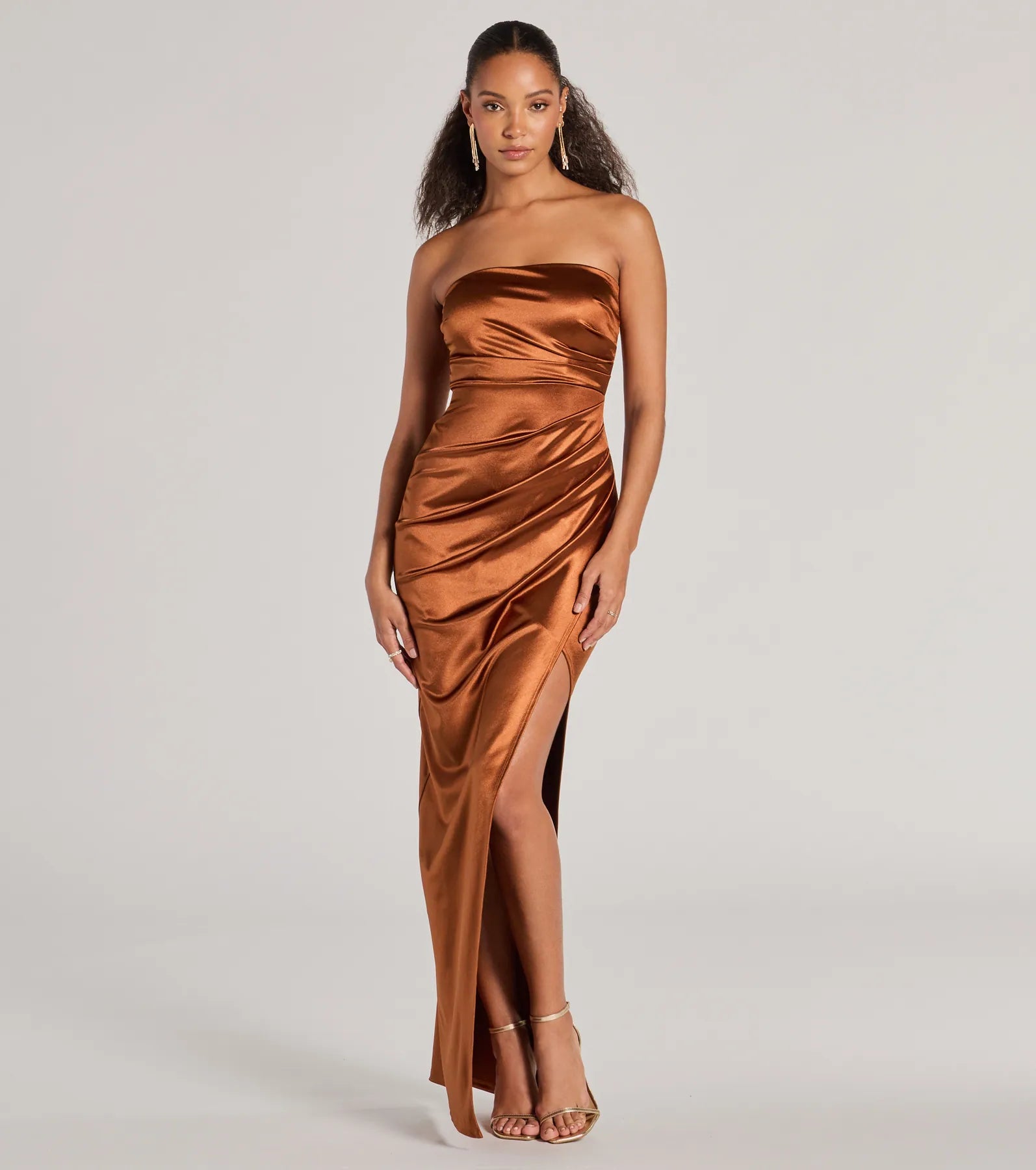 Feel polished and confident in the Lauren Strapless Wrap Slim Satin Formal Dress, a mocha brown prom dress designed with luxe fabric and modern detail that shows off your vibe.