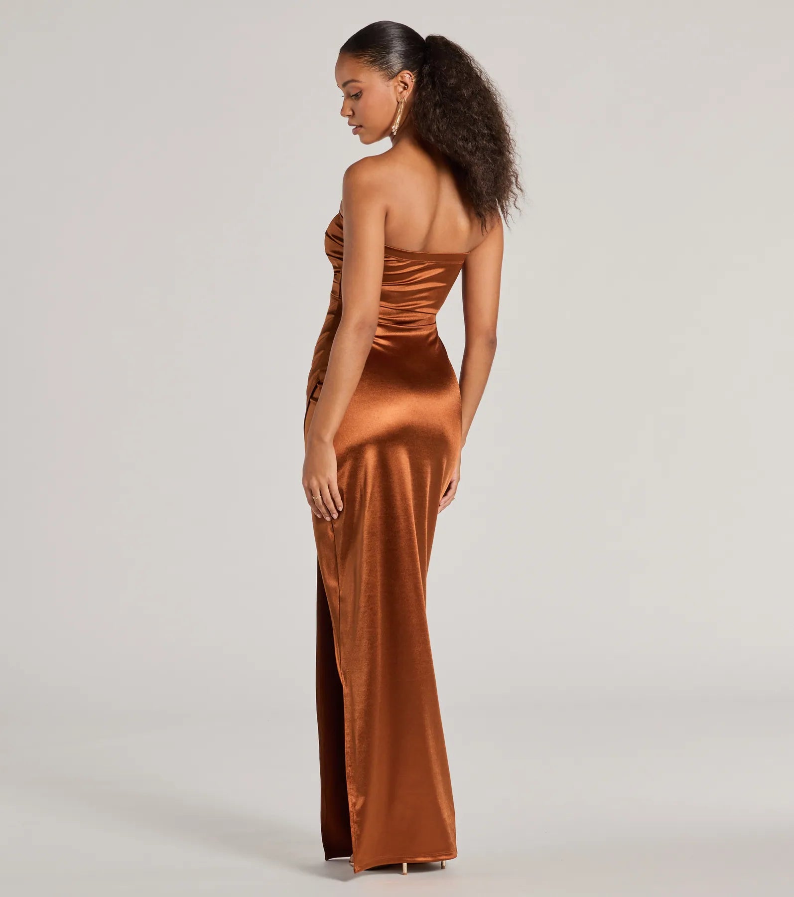 The elegant Lauren Strapless Wrap Slim Satin Formal Dress is a mocha satin bridesmaid dress crafted with luxe fabric, ideal for modern weddings and traditional bridal parties.