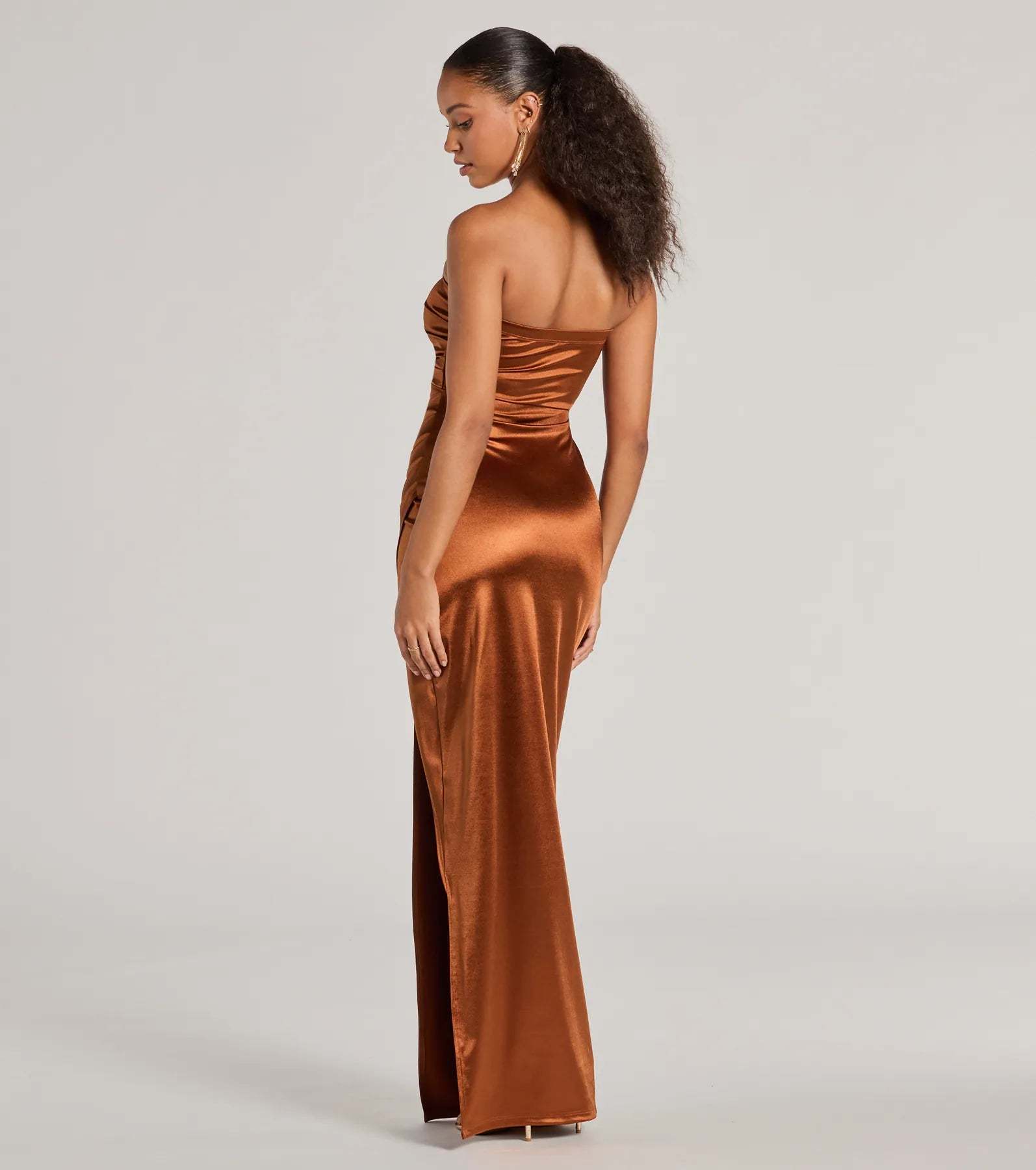 The elegant Lauren Strapless Wrap Slim Satin Formal Dress is a mocha satin bridesmaid dress crafted with luxe fabric, ideal for modern weddings and traditional bridal parties.