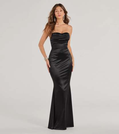 Turn heads at HOCO 2026 in this black homecoming dress, where statement-making details meet the iconic style of the Priscilla Formal Satin Strapless Mermaid Dress .