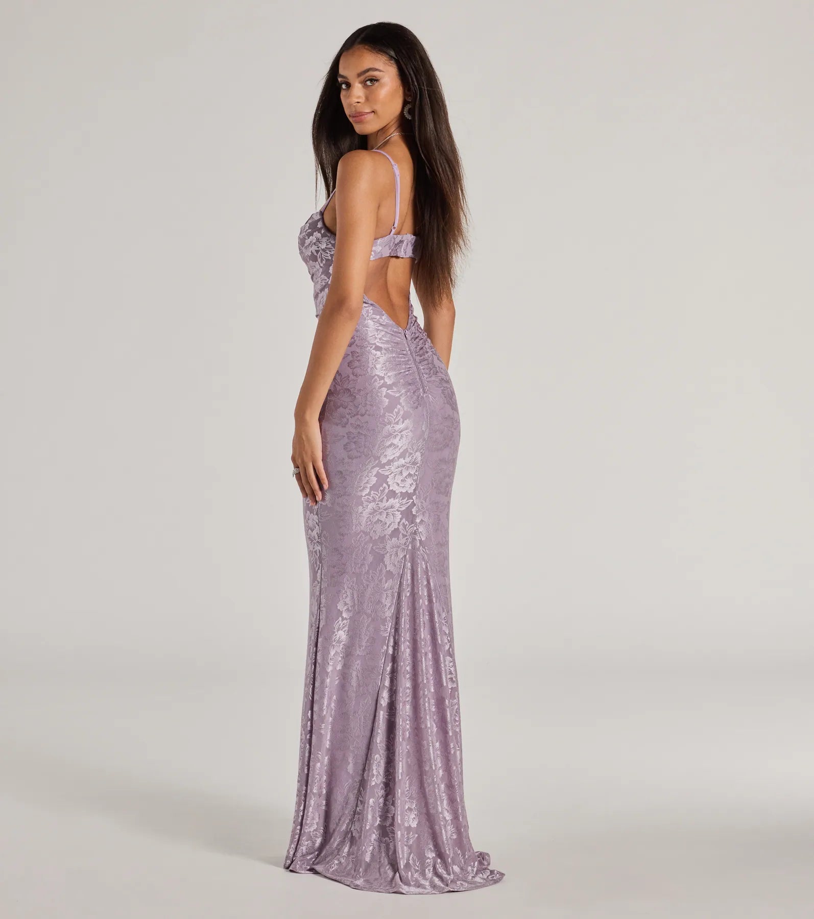 The Haisley Open Back Floral Lace Mermaid Dress is a stylish purple floral dress featuring a fresh seasonal print and flattering design, perfect for garden parties, bridal showers, graduation photoshoots, or everyday styling.