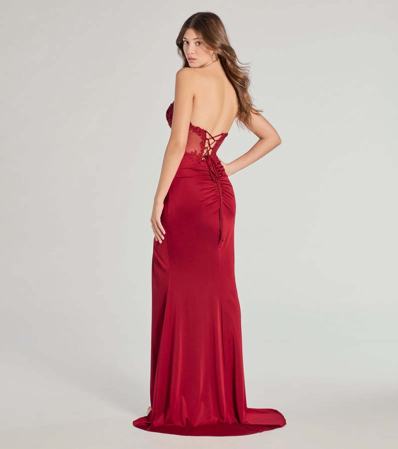 Own every entrance in the Shayla Strapless Corset Lace Formal Dress, a red party dress perfect for milestone birthdays and grad parties, or dancing through Prom nights and unforgettable bachelorette celebrations.