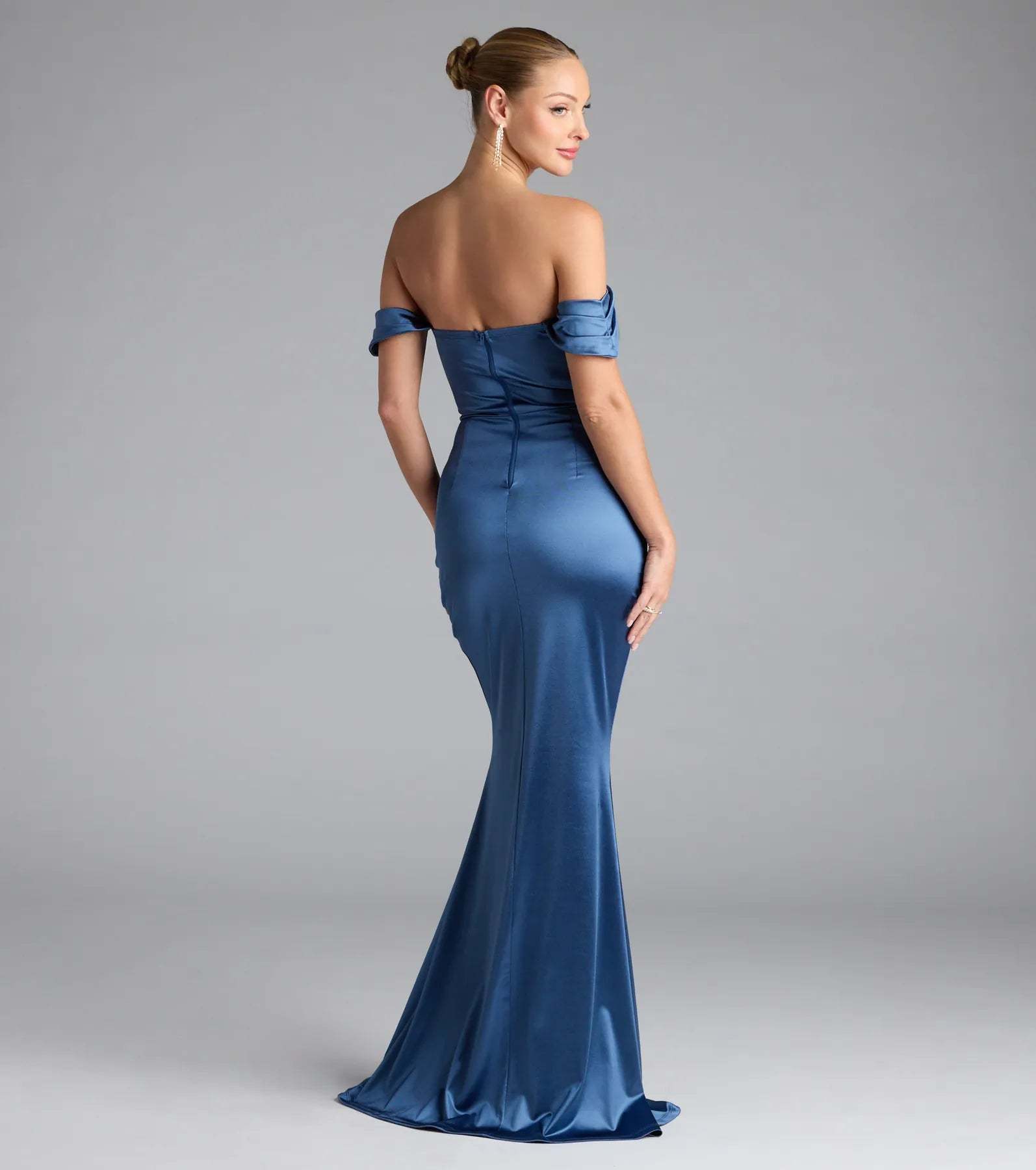 Turn heads at Prom 2026 in this denim blue prom dress, where statement-making details meet the iconic style of the Belinda Off-The-Shoulder Slit Satin Formal Dress.