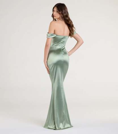 Turn heads at Prom 2026 in this sage green prom dress, where statement-making details meet the iconic style of the Belinda Off-The-Shoulder Slit Satin Formal Dress.
