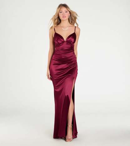 Feel instantly put-together in the Jordyn Formal Satin Mermaid Dress With Train in wine, a stylish wedding guest dress designed for confident style and all-out celebration.