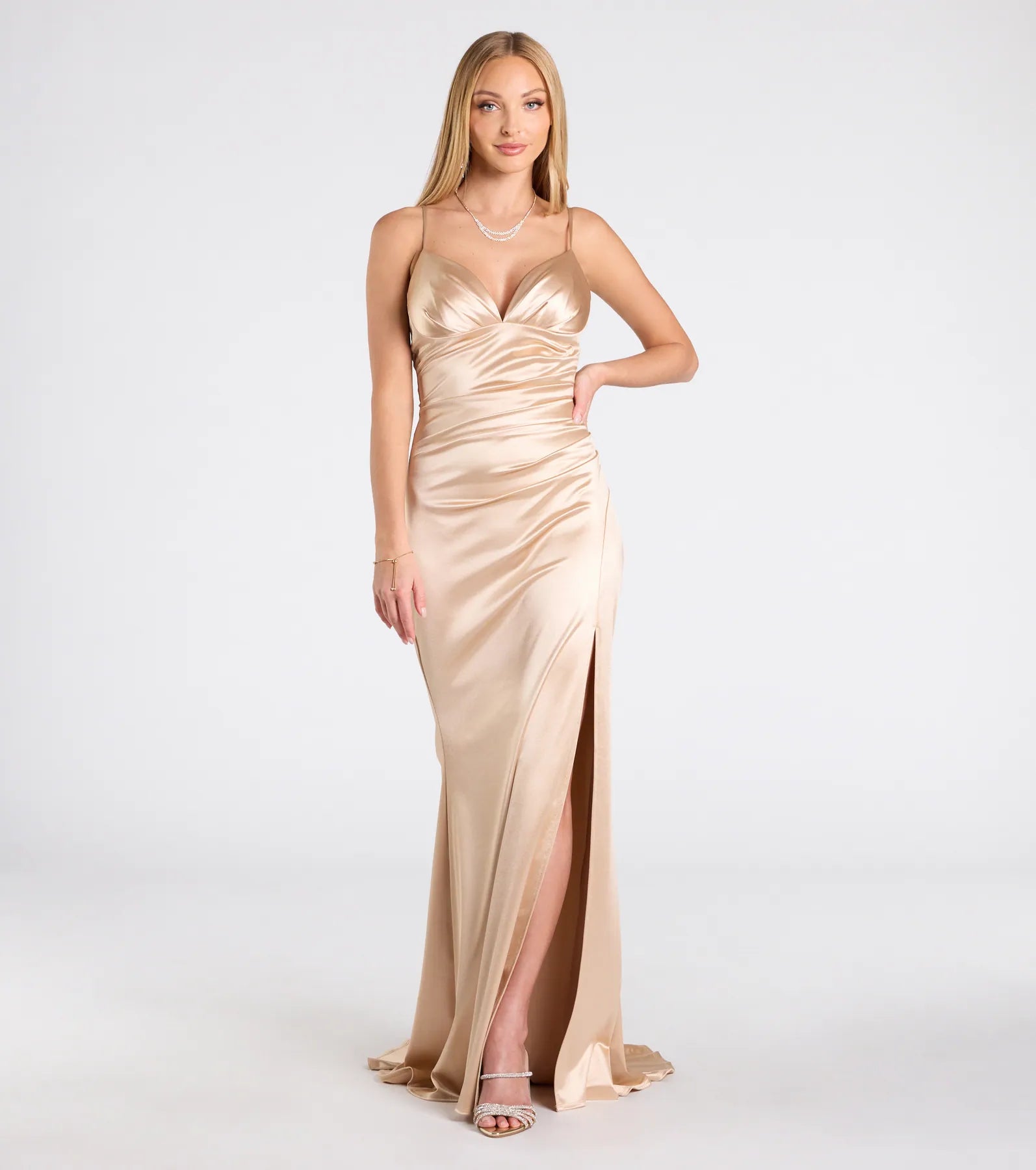 Feel instantly put-together in the Jordyn Formal Satin Mermaid Dress With Train in gold, a stylish wedding guest dress designed for confident style and all-out celebration.