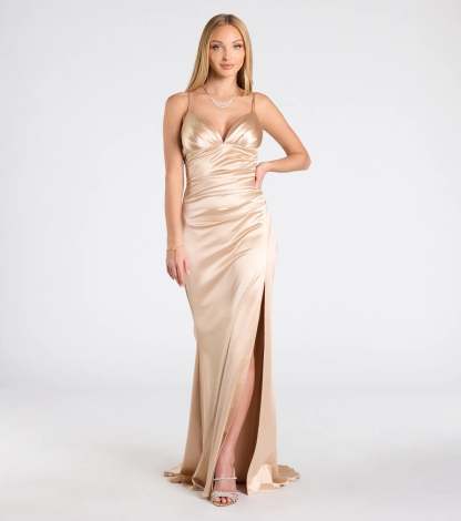 Feel instantly put-together in the Jordyn Formal Satin Mermaid Dress With Train in gold, a stylish wedding guest dress designed for confident style and all-out celebration.
