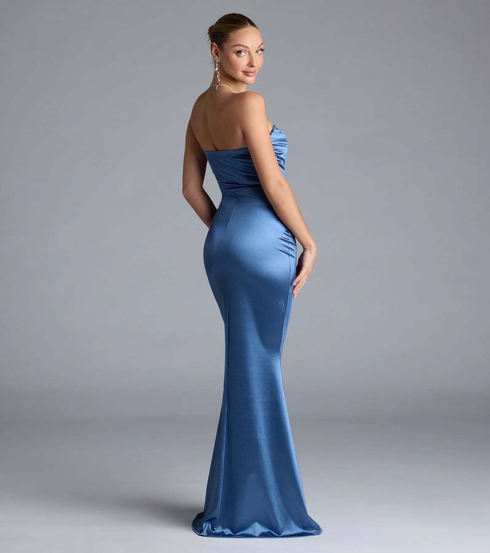 Turn heads at HOCO 2026 in this denim blue homecoming dress, where statement-making details meet the iconic style of the Priscilla Formal Satin Strapless Mermaid Dress.