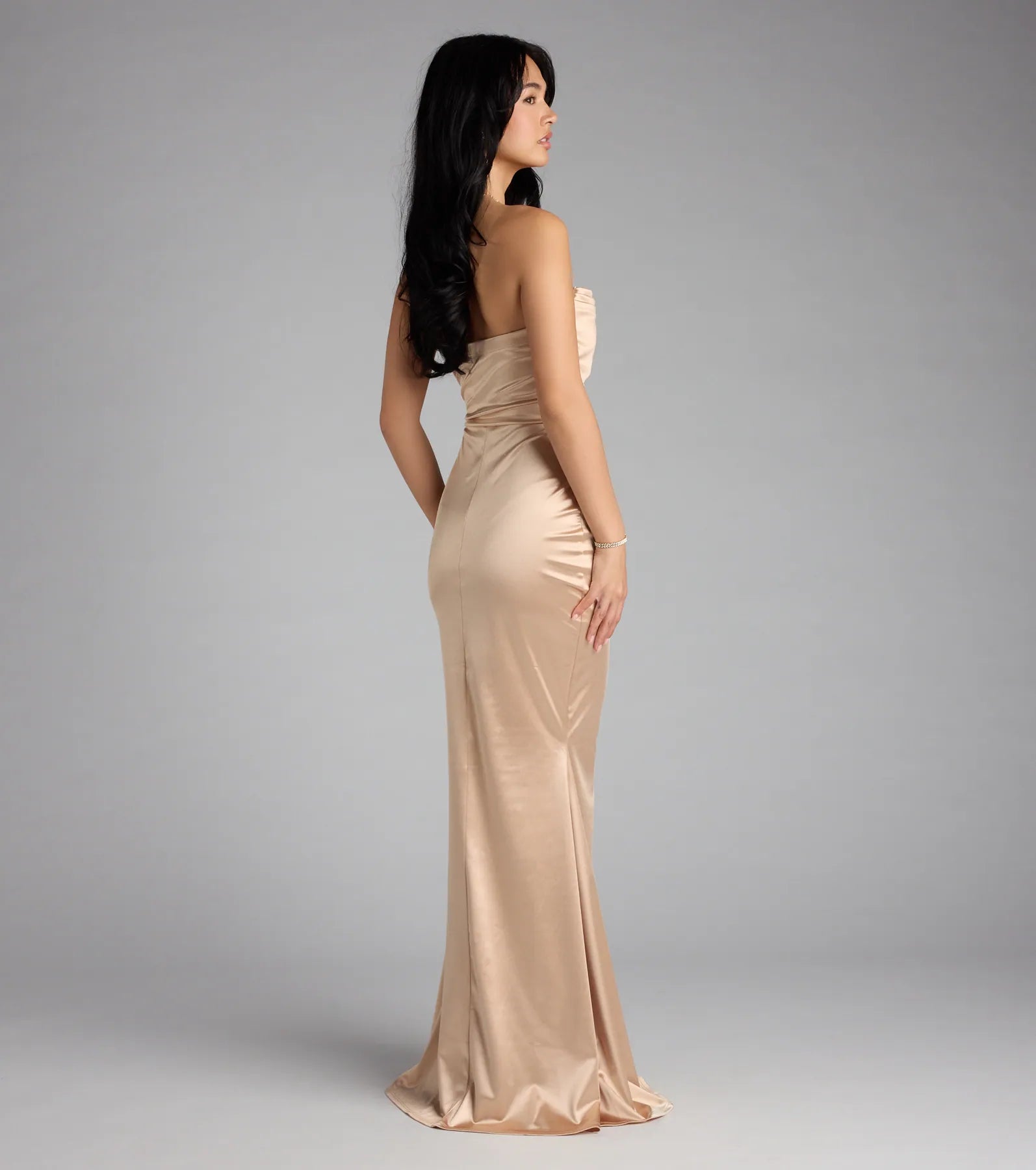 The Priscilla Formal Satin Strapless Mermaid Dress is a taupe prom dress that blends trend-forward design with a flattering fit, perfect for celebrating your night with confidence.