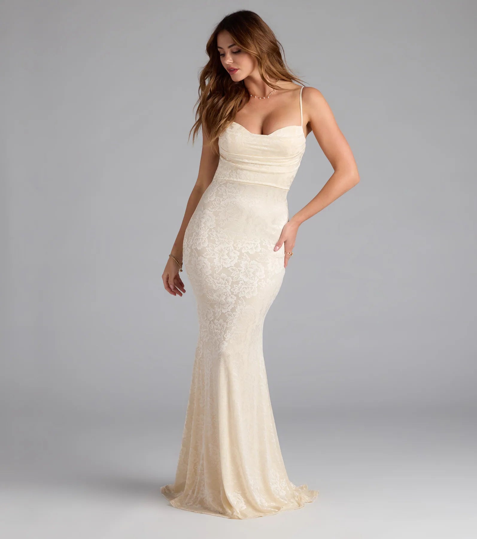 Feel instantly put-together in the Haisley Open Back Floral Lace Mermaid Dress in ivory, a stylish wedding guest dress designed for confident style and all-out celebration.
