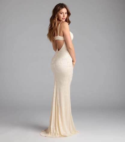 Own the spotlight in the Haisley Open Back Floral Lace Mermaid Dress, a ivory formal dress crafted to deliver luxe style for winter weddings, Military Balls, or any special event.
