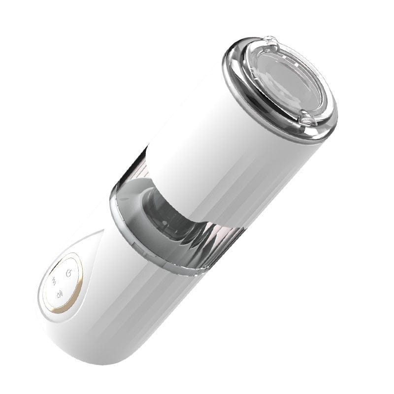 Masturbator with suction base attached to smooth surface