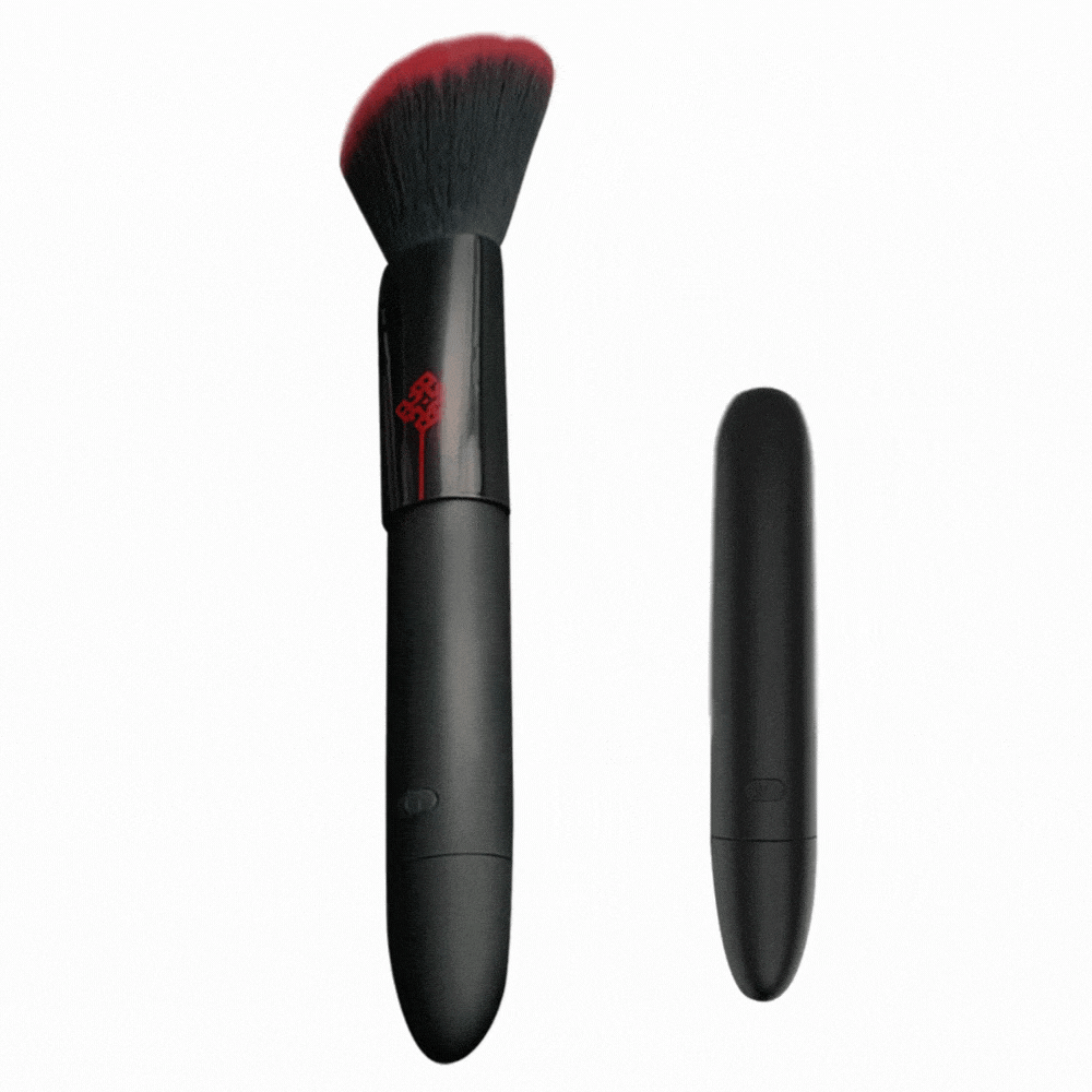 Discreet makeup brush vibrator showing elegant design and soft bristles