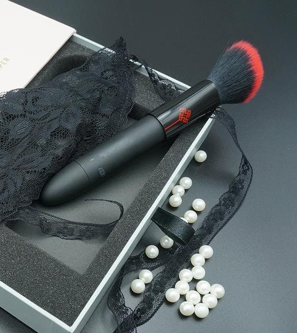 Close-up view of the vibrator's body-safe materials and compact size