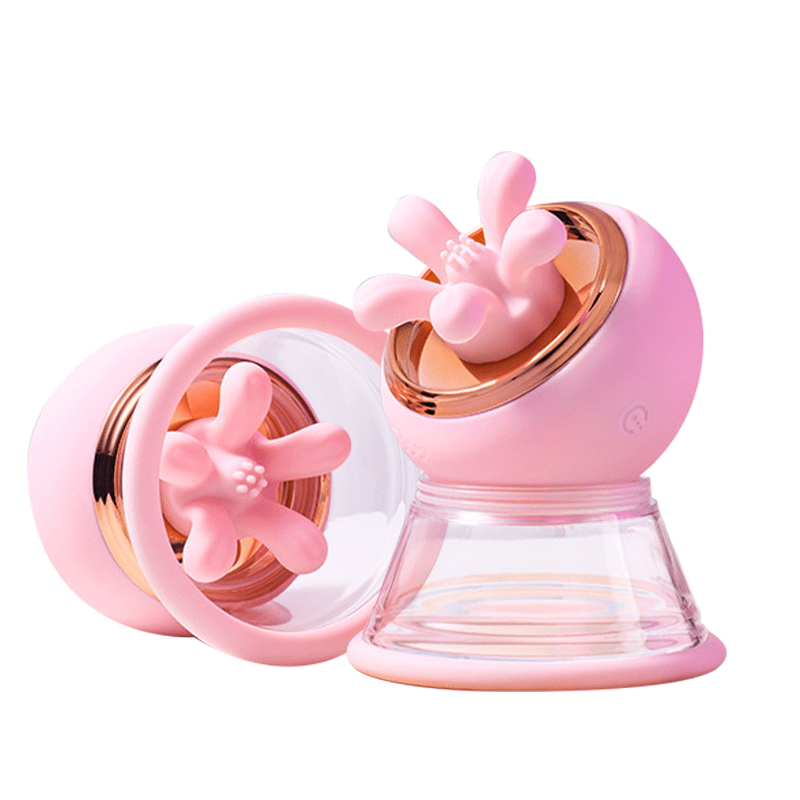 2-in-1 breast massager showing pink silicone and ABS construction