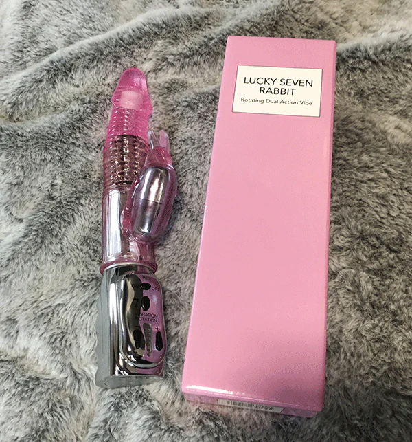 Rotating best selling dual-action rabbit vibe next to packaging 