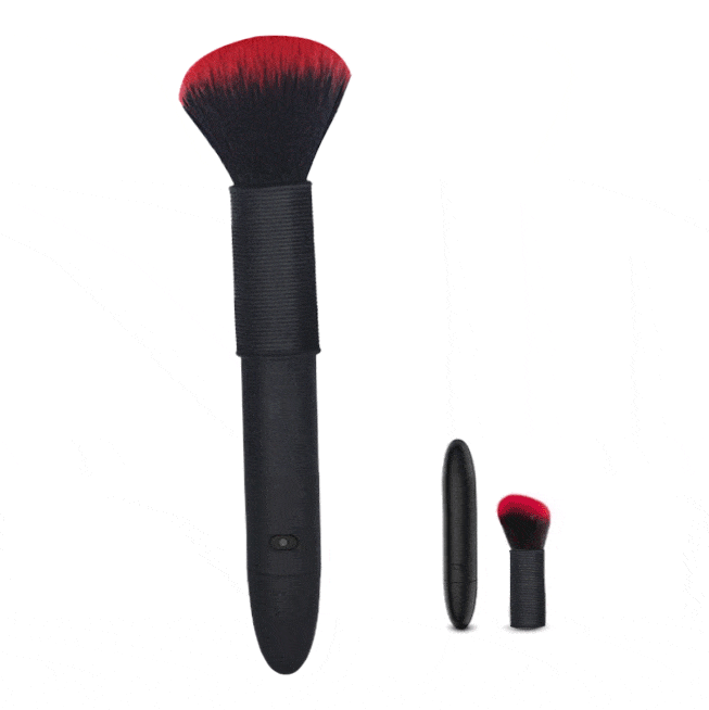 Silicone brush vibrator showing detachable components and soft bristles