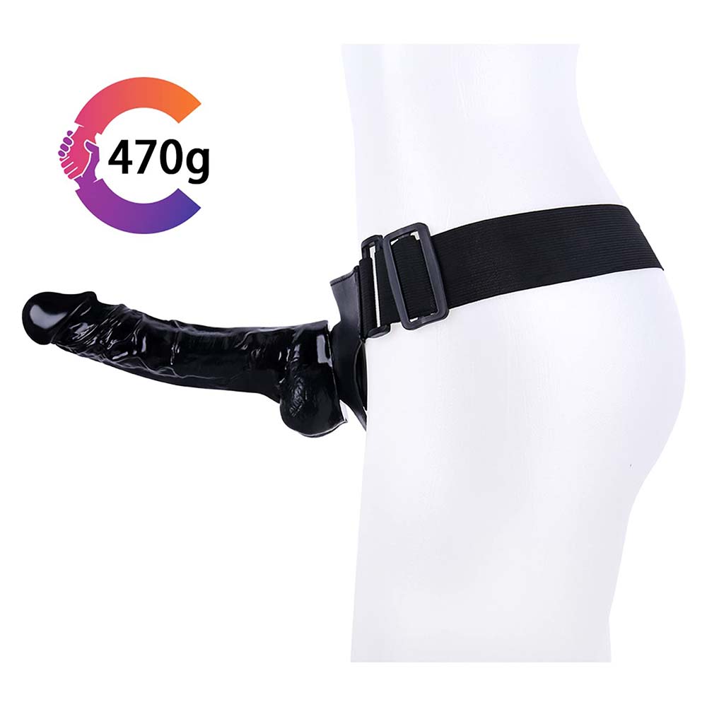 Leather strap dildo showing adjustable harness and realistic design