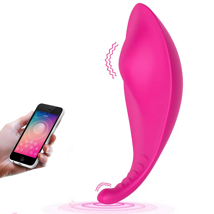Discreet wearable panty vibrator shown in hand demonstrating compact size