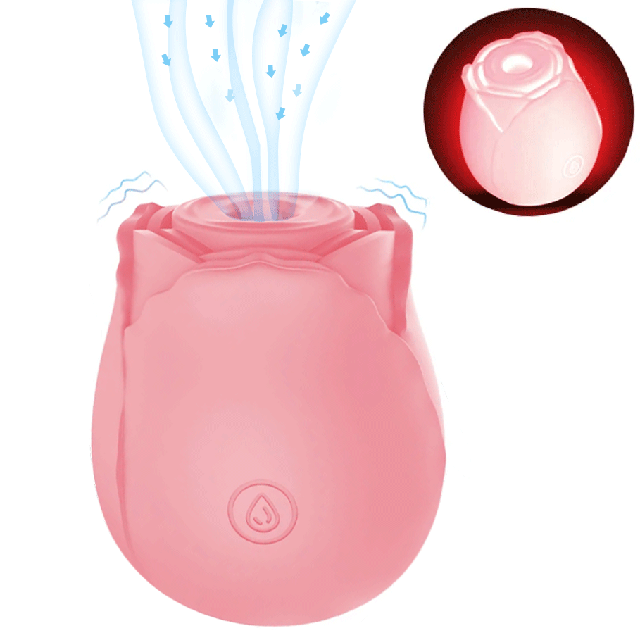 Pink rose clitoral sucker toy with soft silicone petals on display