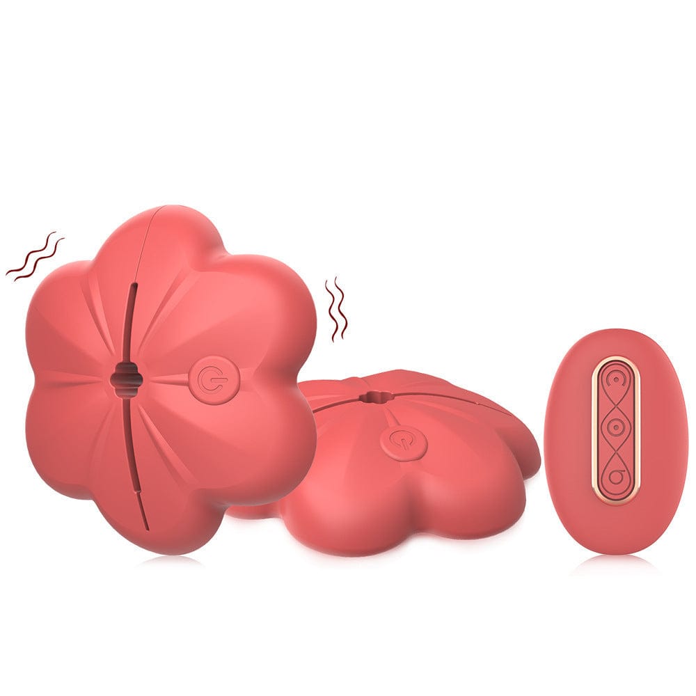 Nipple clamp vibrator in use during shower scene demonstrating IPX5 rating