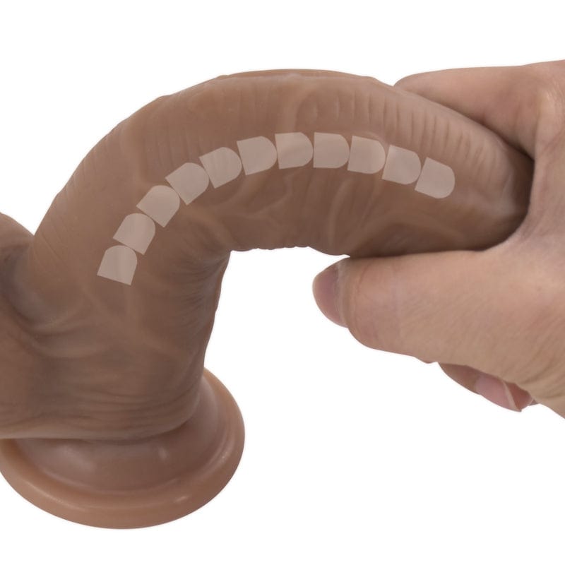 Wearable dildo displayed at angle showing 9.45-inch length and body-safe material