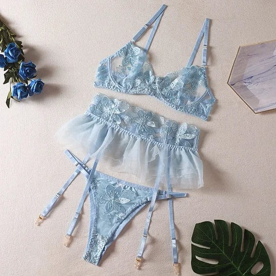 Three-piece embroidered lingerie set front view showing delicate sheer mesh design