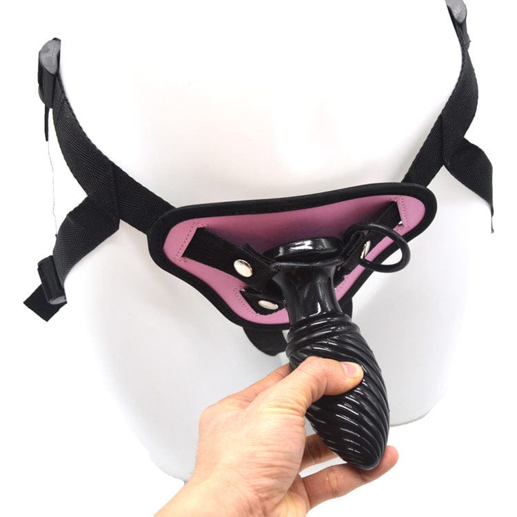 Wearable dildo with small anal plug showing ergonomic design from front angle